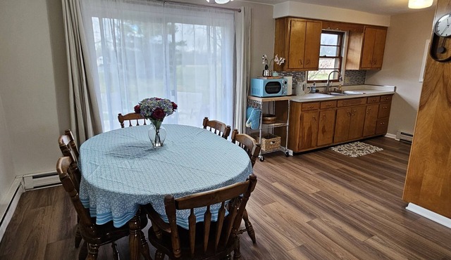 Escape to a colorful, cozy retreat where families and work crews alike can relax
