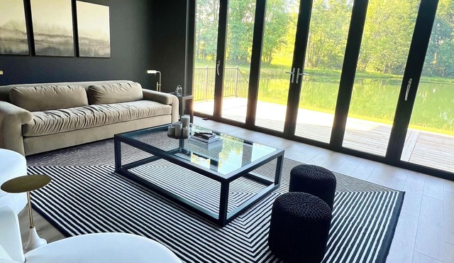 Escape to serenity at our Pondside Modern House