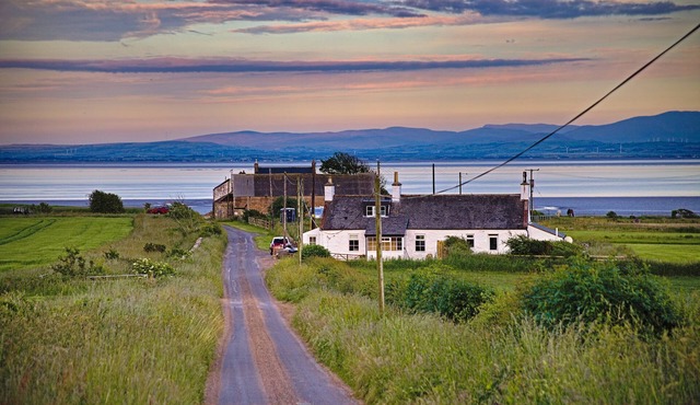 Fabulous seaside cottage with stunning views and 3 double ensuite bedrooms, an enclosed garden in th