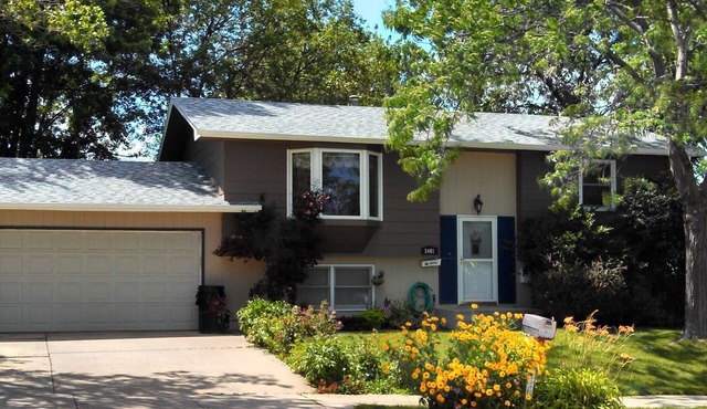 Family friendly, 4 bedrooms, big yard, a cook's kitchen, & treasure!