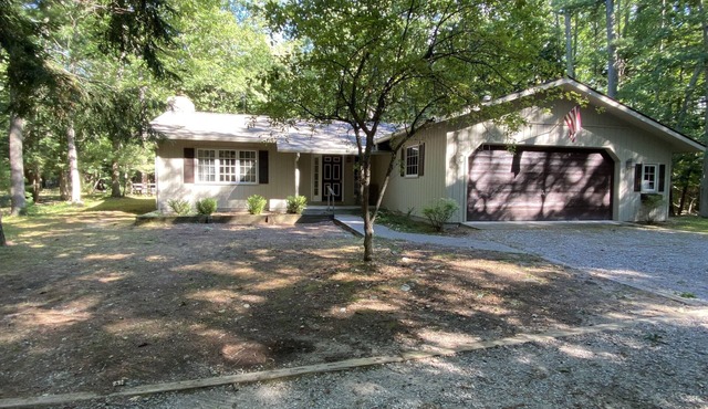 Great Glen Arbor location! Private wooded setting, quick walk to town! Sleeps 9