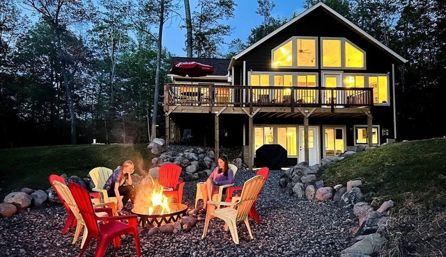 Group Lake Cabin with Ping Pong Table Loaded with Kayaks in Wisconsin