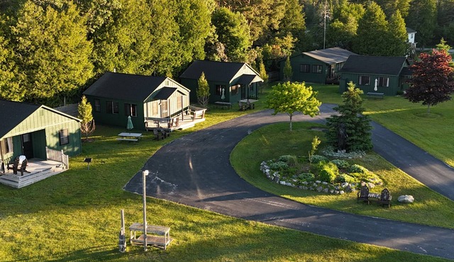 Hessel Bay Resort: 6 cabins + main house. Sleeps 28. Waterfront Lake Huron. Community Dock.