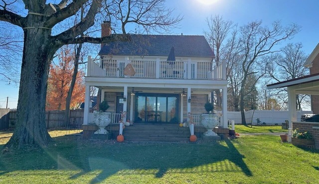 Historic Log Cabin fully restored; gourmet kitchen & much more!