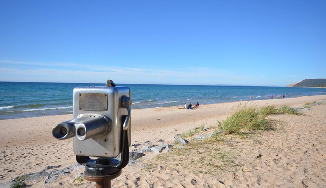 Home in the charming village of Empire. Walk to Lake Michigan beaches.