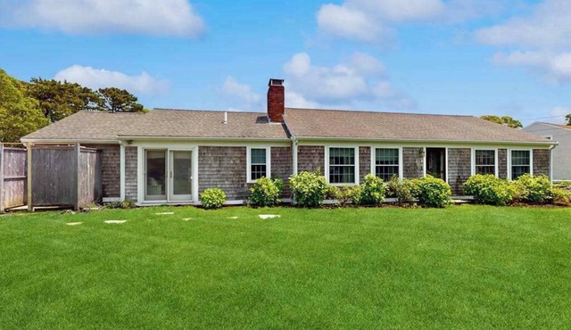 Home near beach & tennis/basketball court with firepit, grill, & patio