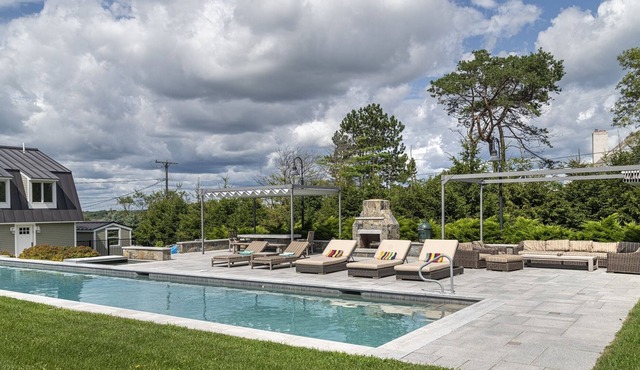 Hot tub, heated pool, spacious lawn, beach access and incredible ocean views.