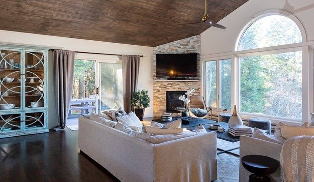 Jaw dropping mountain & lake views in this stylish mountain home….
