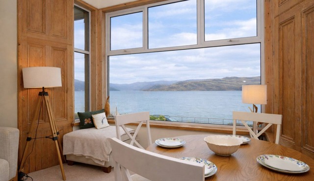 Kames View, shore front location, ground floor, wood burning fire, sleeps 4