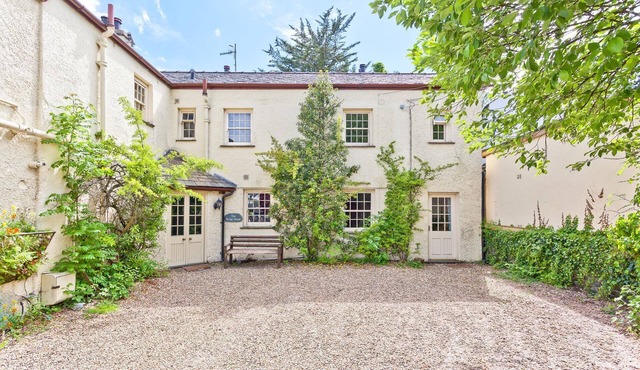 Lake District village cottage sleeping 16 guests in 8 bedrooms with 3 hot tubs