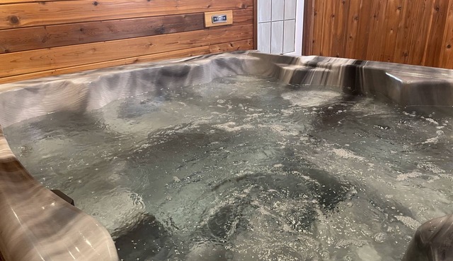 Lakefront Couples’ Retreat with Indoor Hot Tub, Spa Bathroom & Cozy Fireplace