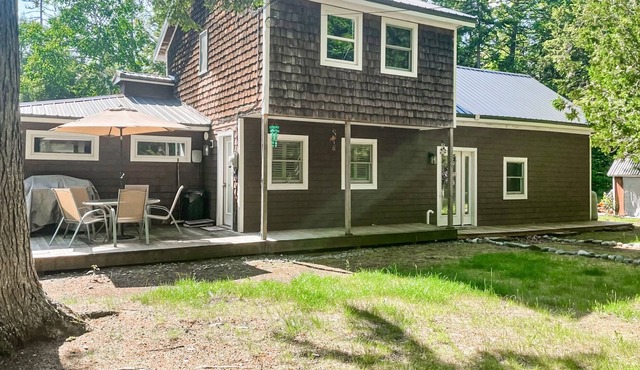 Lakefront home with firepit, deck, seasonal lake access, fast WiFi, grill, views