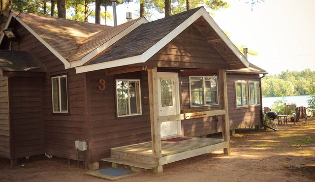 Lakefront level cottage just 35' from the water on premier Hayward, WI lake.