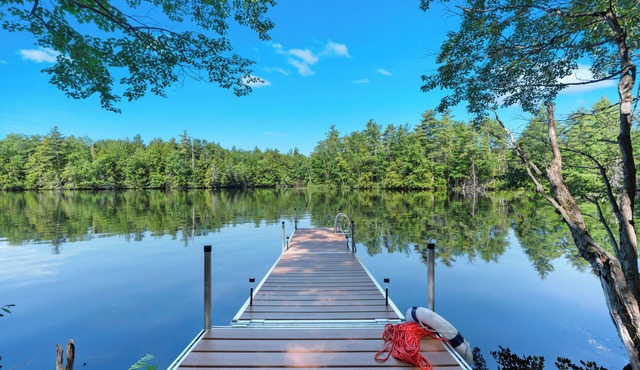 Lakefront Scandinavian Vacation Rental with Private Dock, Hot Tub & Kayaks Brand New, modern home with high end amenities - close to Ogunquit, Kennebunkport and Wells Beaches.