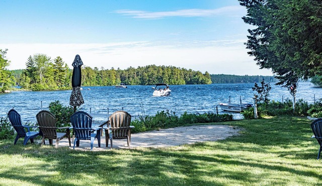Lakehouse with large level yard on pristine Little Sebago Lake
