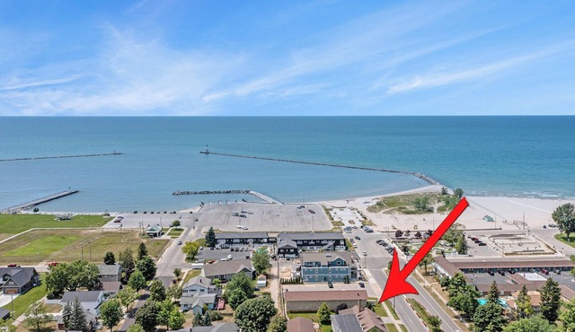 Located 1 block from Ludington Beach