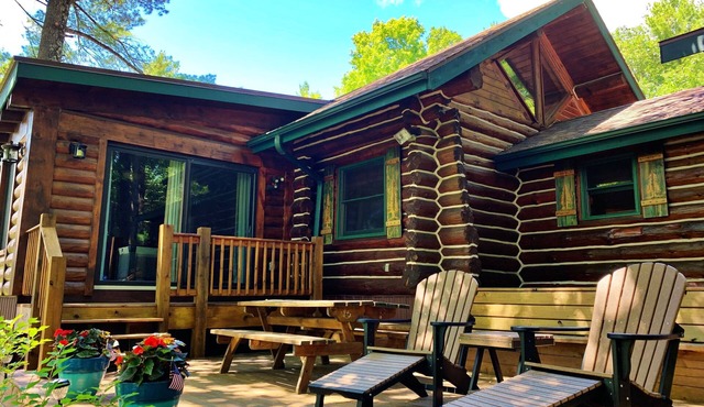 Log cabin on 19 mile Long Lake, large screen porch + dock, 1 acre mature pines