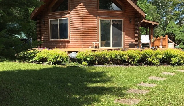 LOG CABIN ON STURGEON RIVER