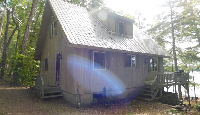 Long Lake chalet and guest house with 200' of water frontage and sunset views