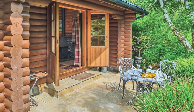 Luxury lodge with king-size four poster and child size single.