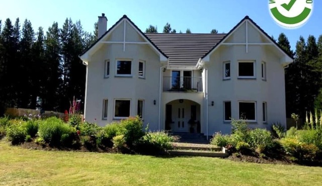 Luxury Scottish Highland Country House with large private gardens by Inverness