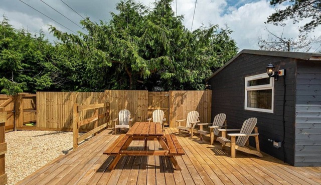 Modern cabins with sunny lounge & deck sleeps 18