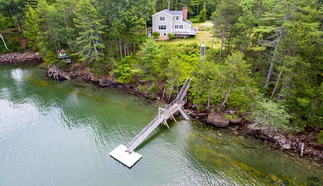 Modern cottage beautifully set on Wilson Cove with stunning westerly views
