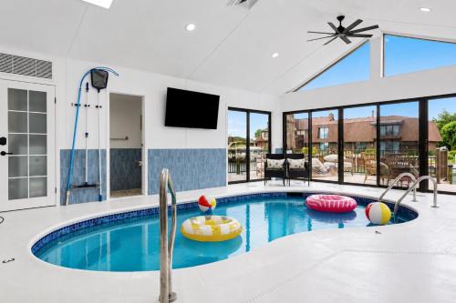 NEW! 4BR I Indoor Pool on the Bay in Boat Town USA