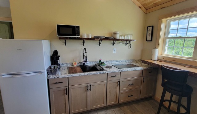 NEW Cozy Cabin located in Oakland tucked away in a peaceful wooded scene.