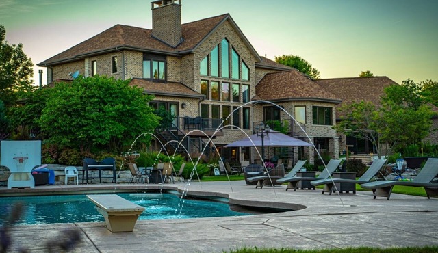 NEW LISTING! Mansion on the Lake (8-Bedroom Home) with Pool by RedAwning