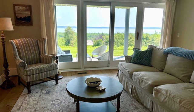 Newly renovated condo with expansive view of Little Traverse Bay near downtown.