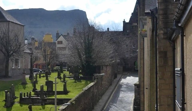 Next to the Palace and Royal Mile with parking