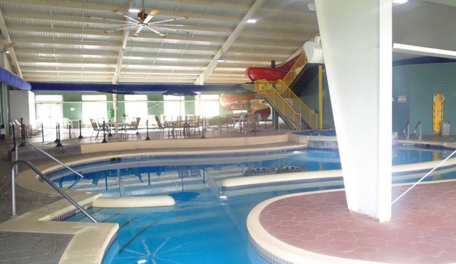 One Room w/King Bed | Free Breakfast | Access to Pool w/Slide & Jacuzzi