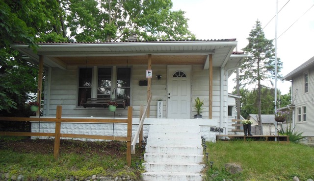 Quaint cottage home in scenic Riverside area in heart of Indianapolis