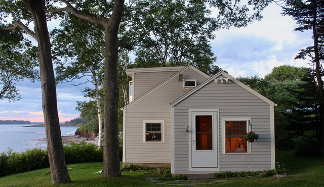 Quaint cottage intimately set on the rocky coast overlooking Casco Bay