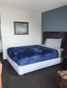 Queen Bed Hotel Room 303