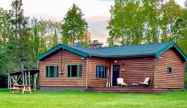 Relax and reconnect at our retreat on the Au Sable River "Holy Waters".