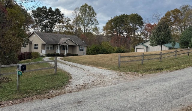 Relaxing 2-bedroom house on a back country road. Private deck in wooded area.