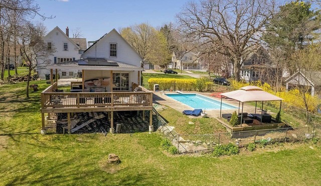 Relaxing 3-bedroom Home in Avon with Pool, Theatre room, AC , Large Deck, & Yard