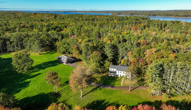 Renovated farmhouse on an acreage with grill, four-bedrooms, & W/D - river views