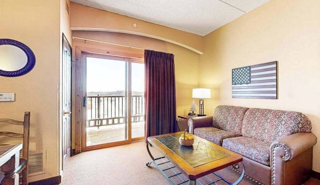 Riverside resort studio with balcony