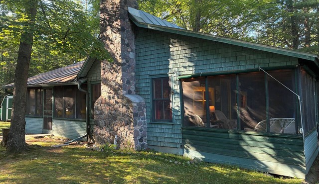 Rustic 1920s Lakefront Cabin with 2 Bedrooms + Sleeping Porch