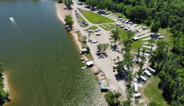 RV on a lake in a campground. Great for parties
