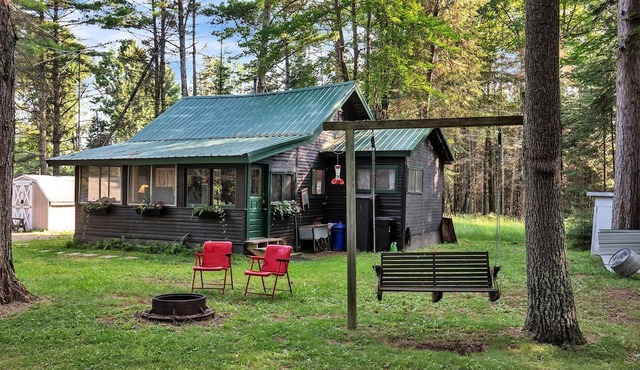 Secluded Cabin Nestled Amidst Trees and Fire Pit Provided in Hazelhurst, Wisconsin