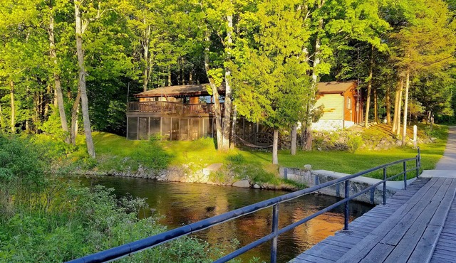 Secluded Cottage on the Boardman River w/Hot Tub & Fireplace