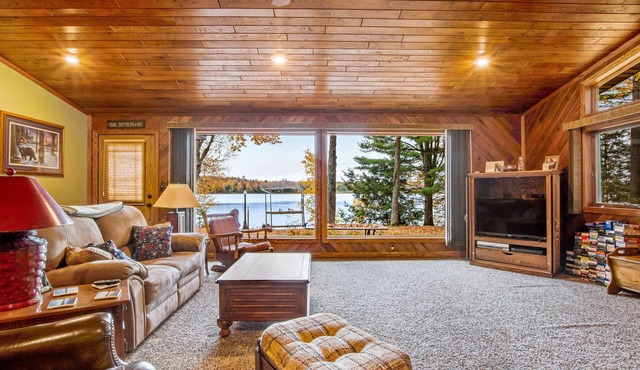 Secluded lakefront home with kayaks, canoe, swim platform, firepit, & W/D