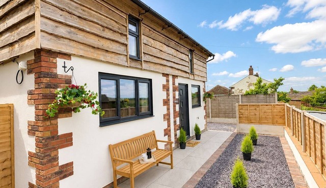 Sleeps 2 in a quiet village location with hot tub and garden