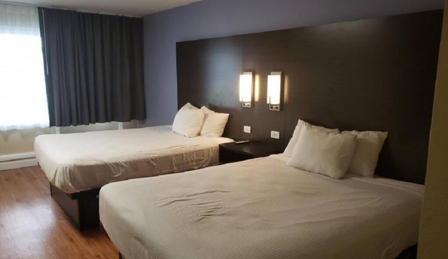 Smmoking 2 Queen Beds at Envi Boutique Hotel