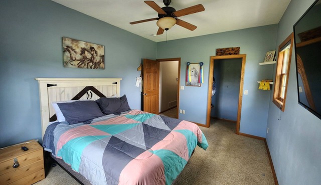 Spacious 5-bedroom house in charming Oshkosh with WiFi, fitness room