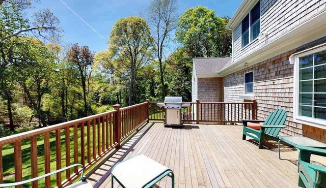 Spacious home with huge deck & tree-lined yard, grill, & WiFi - great location
